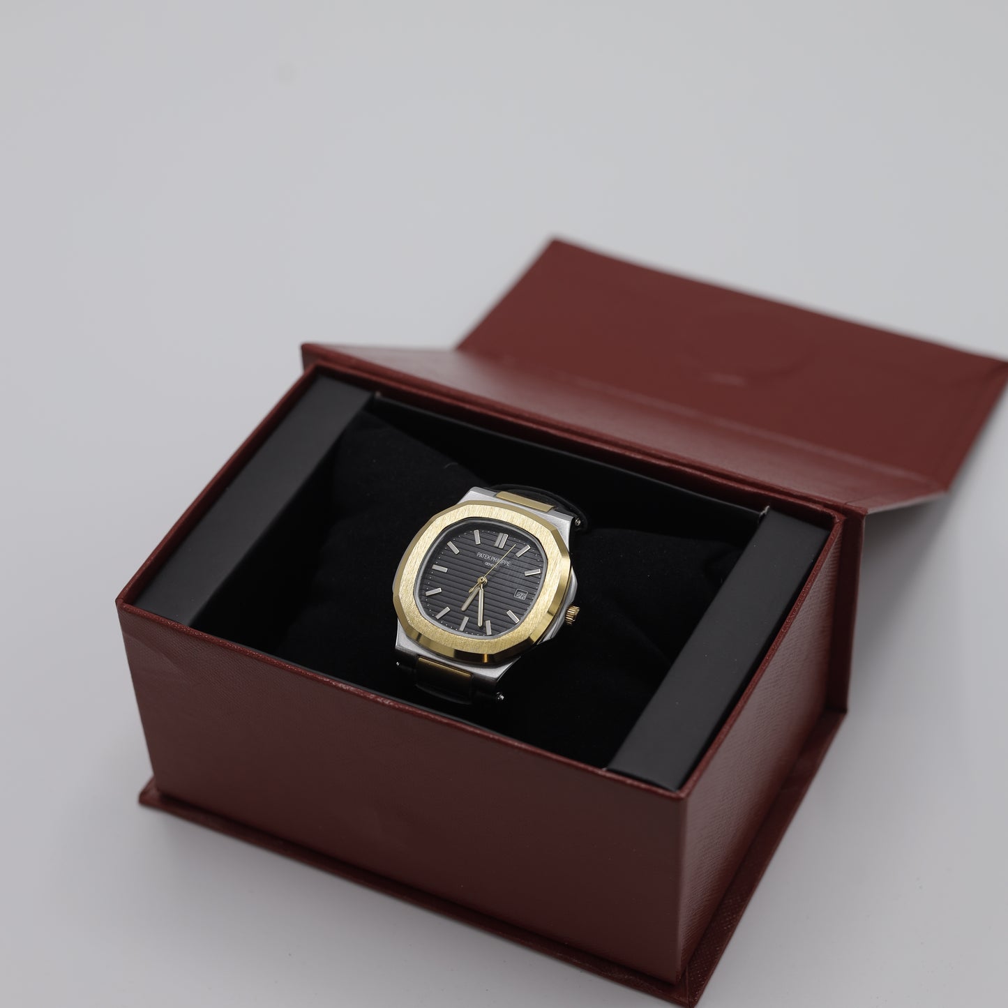Patek Philippe Nautilus Style Watch - Classic Black and Gold Dial & Leather Strap