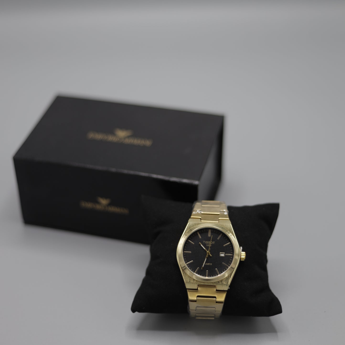 Tissot PRX Yellow Gold Black Dial Quartz Watch.