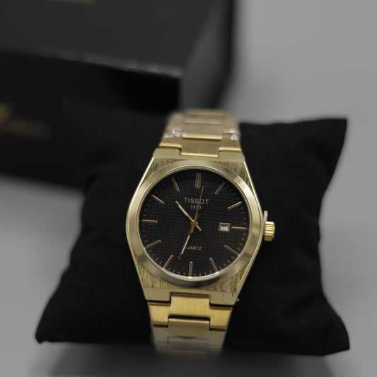 Tissot PRX Yellow Gold Black Dial Quartz Watch.