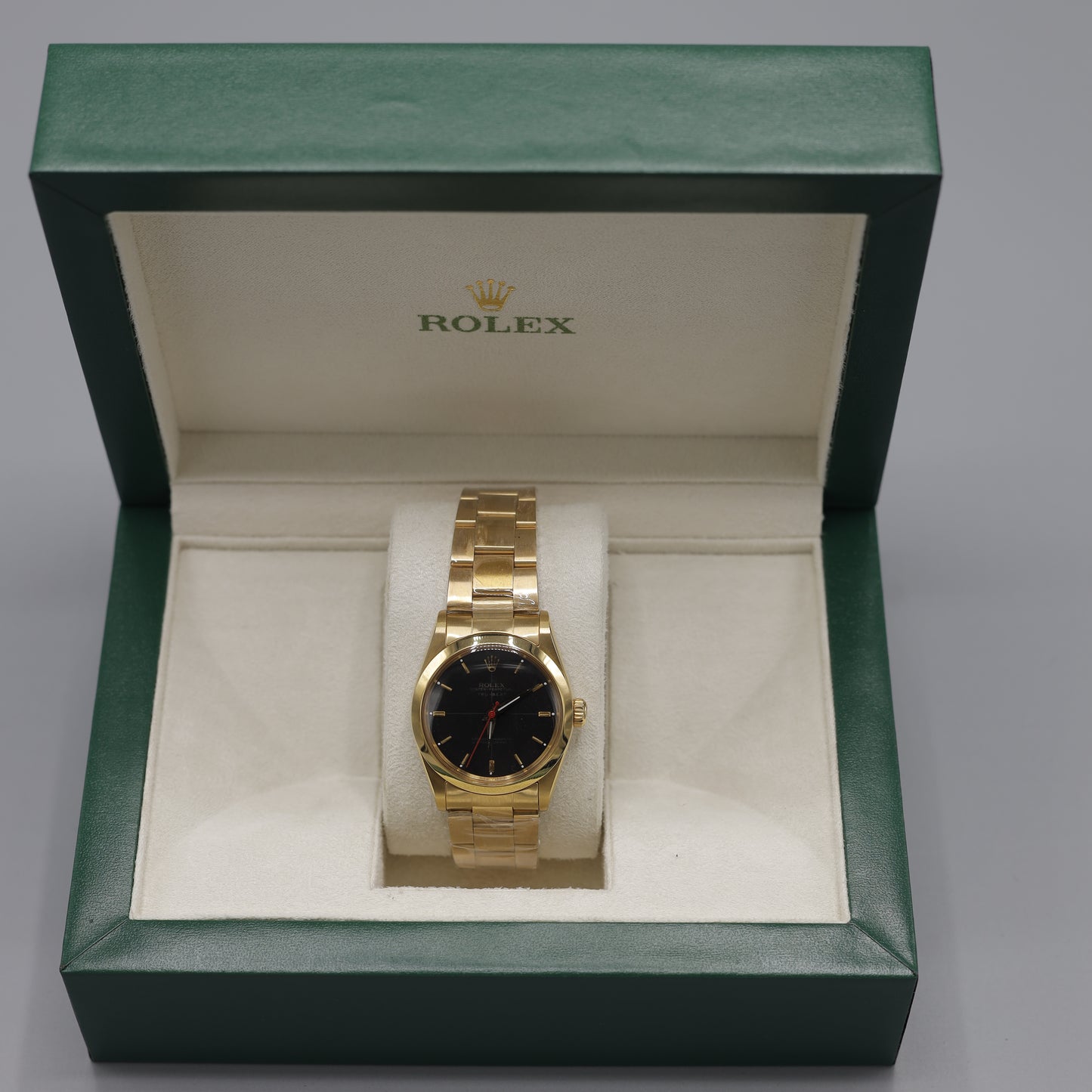 Rolex Oyster Perpetual Gold Watch with Black Dial
