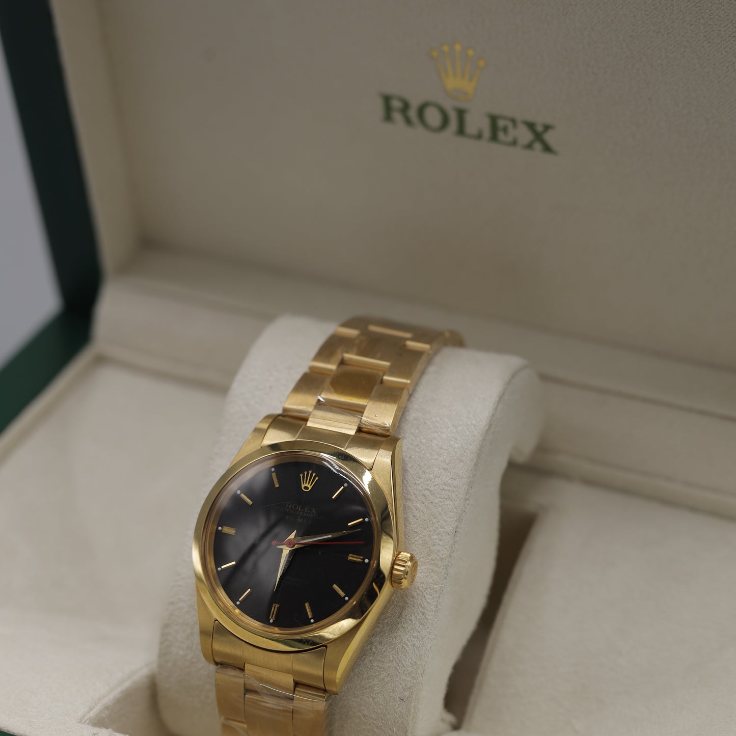 Rolex Oyster Perpetual Gold Watch with Black Dial