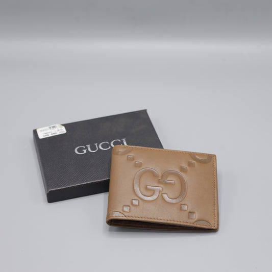 Gucci Tan Leather Bifold Wallet β Embossed GG Logo