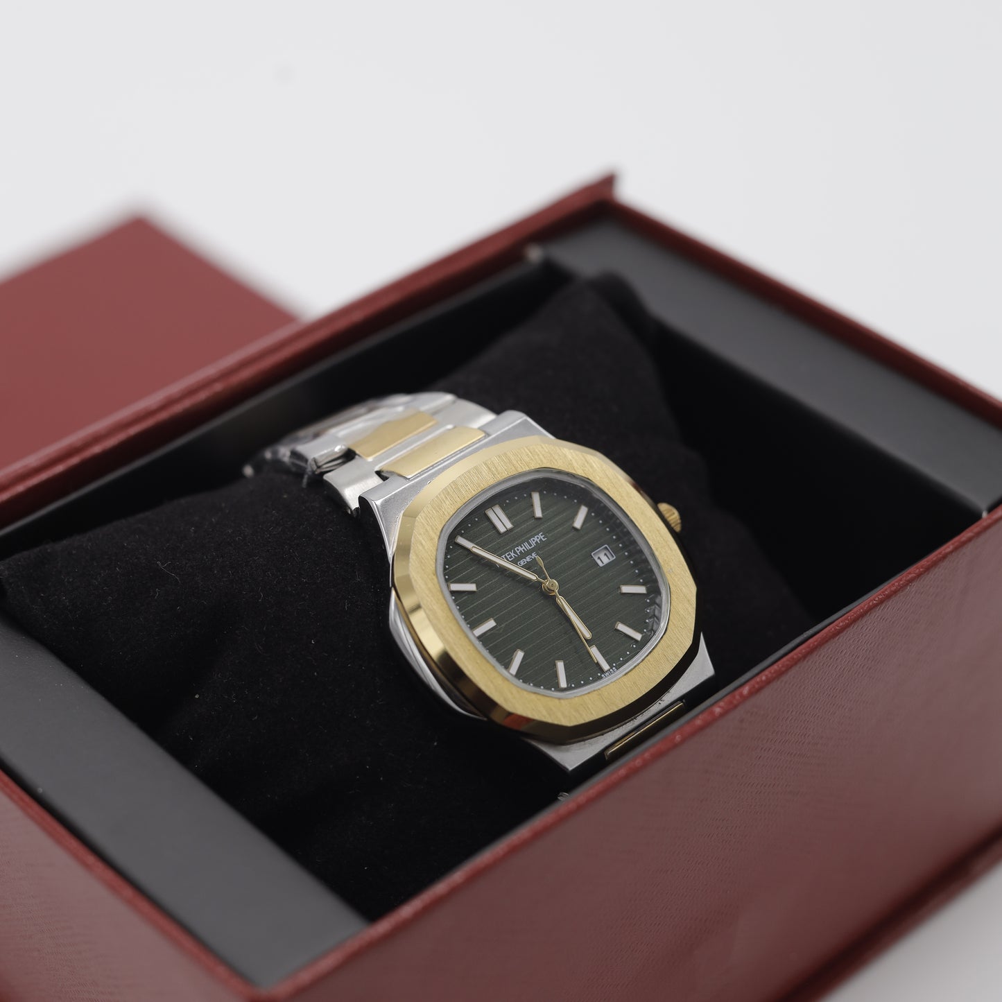 Patek Philippe Nautilus - Gold & Silver Stainless Steel Watch