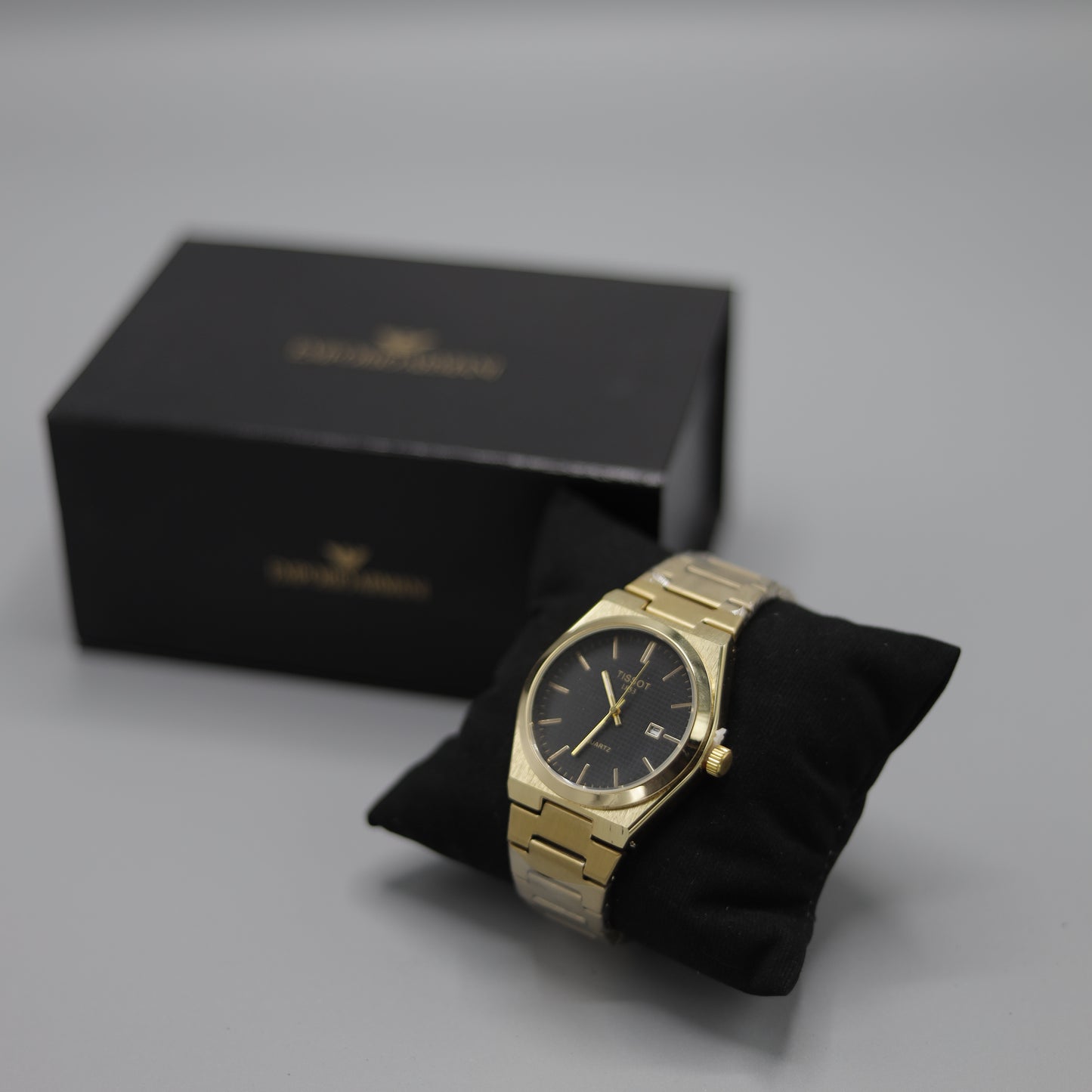Tissot PRX Yellow Gold Black Dial Quartz Watch.
