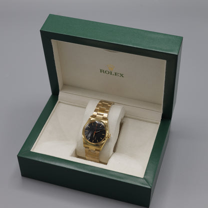 Rolex Oyster Perpetual Gold Watch with Black Dial
